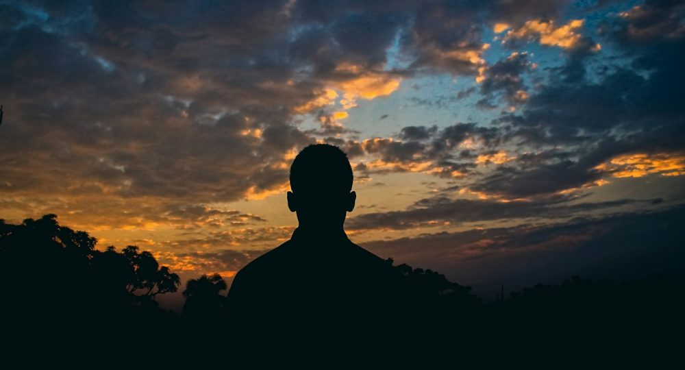 silhouette of people during sunset