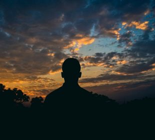 silhouette of people during sunset