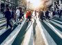 group of people walking on pedestrian lane